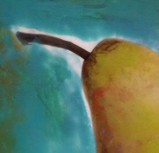 Close-up of an encaustic artwork showing a soft halo of light around a pear against a turquoise background